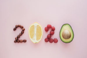 2020 made from healthy food on pastel pink background